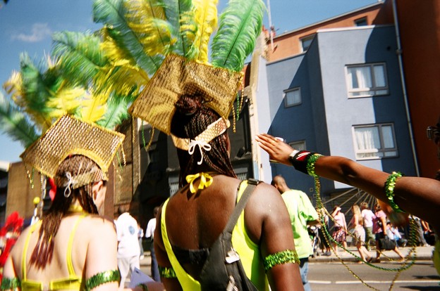 Back view of carnival performers