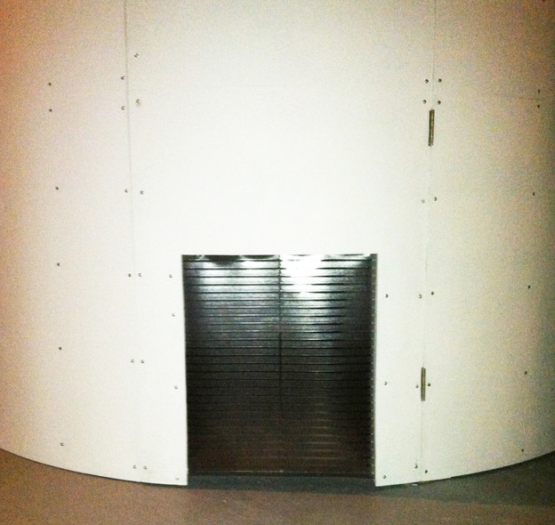 The dog door to the observatory projecting a live-feed of Sirius