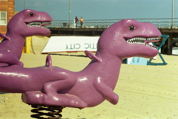Smiling purple dinosaurs