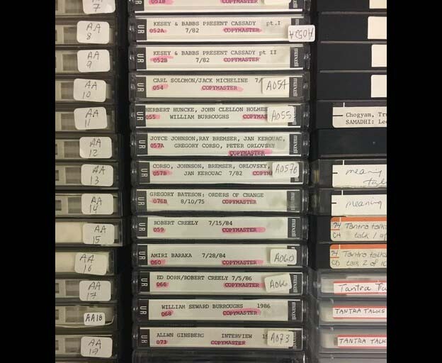 Columns of copymaster cassette tapes from the Naropa Archives in a drawer