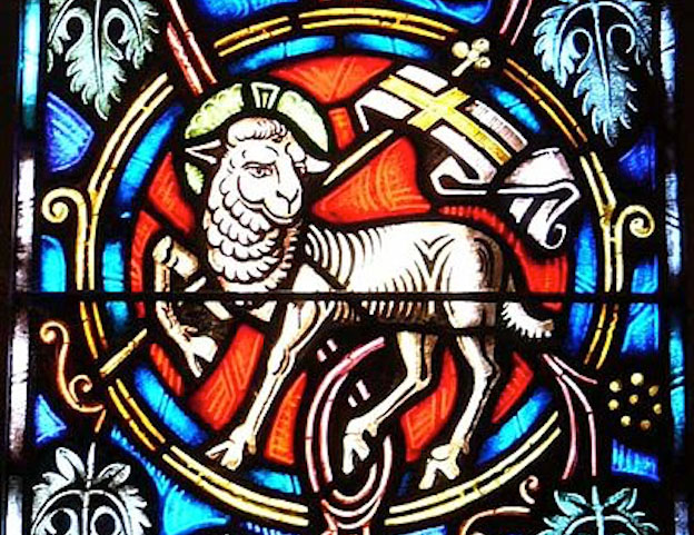 'If ardour is that thing — whether in the romance or the saint’s life — that heats us up to jump from one phase of being to another, Brossard’s ardour intensifies but also idles.' Lamb of God stained glass image from St. Ignatius church in Massachusetts; photo by John Workman via <a= href"https://commons.wikimedia.org/wiki/File:Stained_glass_Agnus_Dei.jpg">the English Language Wikipedia</a>.