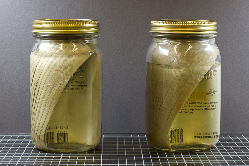 Two jars from Tony White's pickled books (1992) Tony White -- Pickled Books