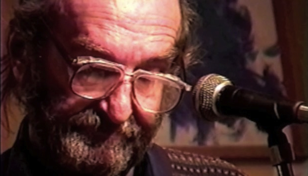 John Wieners at his last public reading in February 2002 (still from a video by Derek Fenner).