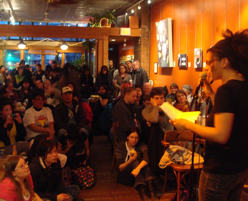 Cecily Nicholson reads at the Rhizome Café in Vancouver Cecily Nicholson reads at the Rhizome Café in Vancouver