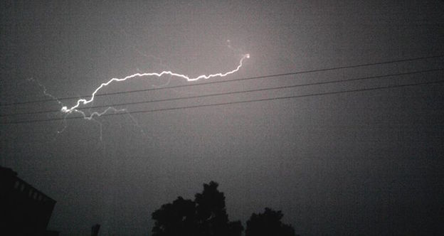 "A bolt in response to a call. It gathered and branched and struck. Like lightning answers thunder, which is to say, simultaneously." Photo by YVSREDDY, via <a href= https://commons.wikimedia.org/wiki/File:Lightning_(YS).jpg>Wikimedia Commons</a>.
