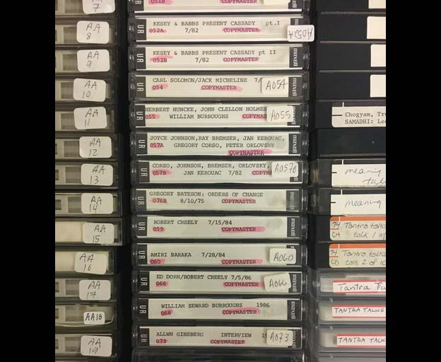 Copymaster cassette tapes in the Naropa audio archives, photographed by Amanda Rybin Koob. Columns of copymaster cassette tapes from the Naropa Archives in a drawer